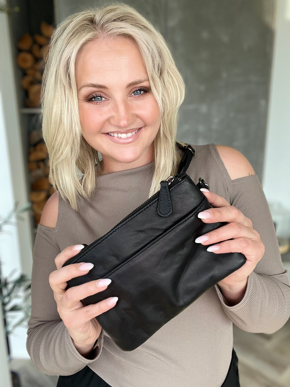 Crossbody taska með mörgum hólfum