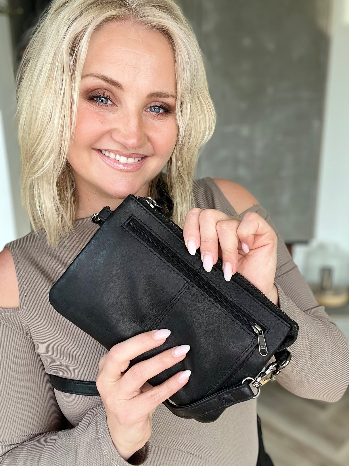 Crossbody taska með mörgum hólfum