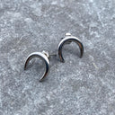 Krista eyrnalokkar mána